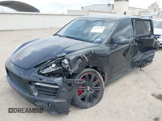 2014 Porsche Cayenne GTS with VIN WP1AD2A25ELA71350, listed as a IAAI auction lot 42031766 with 104,184 mi miles and . Bid and sale history available at DreamBid. Image 17.