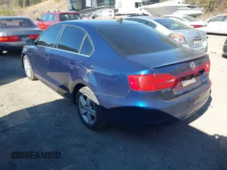 2014 Volkswagen Jetta TDI w/Premium with VIN 3VWLL7AJ8EM432471, listed as a IAAI auction lot 41695764 with 116,083 mi miles and . Bid and sale history available at DreamBid. Image 3.