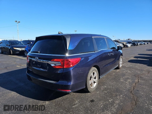 2018 Honda Odyssey EX-L z VIN 5FNRL6H75JB064377, wystawiony jako Copart lot #89319585 z przebiegiem 103 620 mil mil oraz Czysty tytuł • Clean title. Historia ofert i sprzedaży dostępna na DreamBid. Obrazek 4.