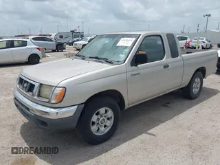 1999 Nissan Frontier XE with VIN 1N6DD26S0XC317003, listed as a IAAI auction lot 42451418 with 246,667 mi miles and . Bid and sale history available at DreamBid. Image 2.