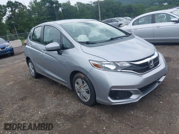 2019 Honda Fit LX z VIN 3HGGK5H45KM725916, wystawiony jako IAAI lot #42654907 z przebiegiem 92 580 mil mil oraz . Historia ofert i sprzedaży dostępna na DreamBid. Obrazek 1.