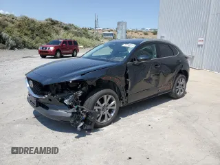 2024 Mazda CX-30 S Premium with VIN 3MVDMBDMXRM682702, listed as a Copart auction lot 59981805 with 21,505 mi miles and Salvage title. Bid and sale history available at DreamBid. Image 1.