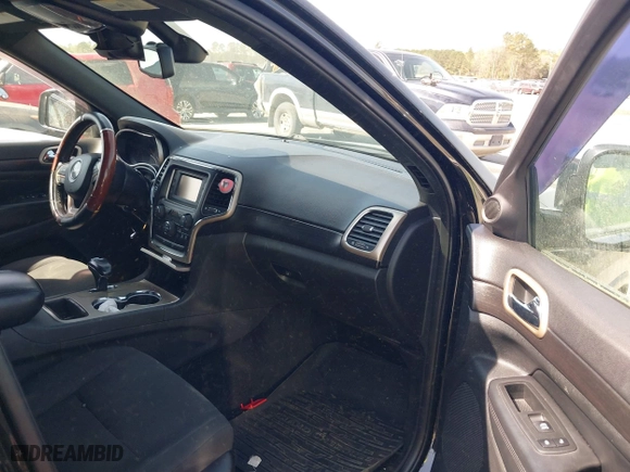 2014 Jeep Grand Cherokee Laredo with VIN 1C4RJEAG1EC263584, listed as a IAAI auction lot 41936615 with 391,334 mi miles. Bid and sale history available at carsss.com. Image 5.