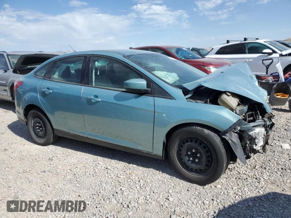 2012 Ford Focus SE with VIN 1FAHP3F24CL163896, listed as a Copart auction lot 61651015 with Not provided miles and Salvage title. Bid and sale history available at DreamBid. Image 4.