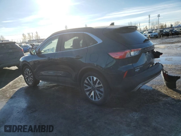 2020 Ford Escape Titanium Hybrid with VIN 1FMCU9DZXLUB46252, listed as a Copart auction lot 88801835 with 64,443 mi miles and Salvage title. Bid and sale history available at DreamBid. Image 2.