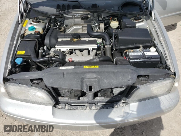 2000 Volvo S70 z VIN YV1LS56DXY2671099, wystawiony jako Copart lot #75080174 z przebiegiem Nie podano mil oraz Nie do naprawy • Non repairable. Historia ofert i sprzedaży dostępna na DreamBid. Obrazek 11.