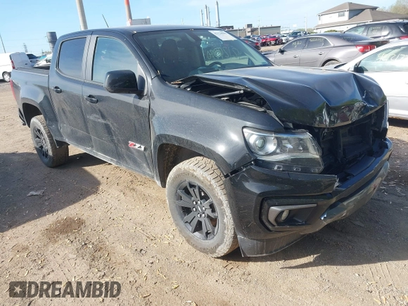 2021 Chevrolet Colorado 4WD Z71 with VIN 1GCGTDEN5M1167486, listed as a IAAI auction lot 42124990 with 162,297 mi miles and . Bid and sale history available at DreamBid. Image 1.