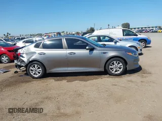 2016 Kia Optima LX with VIN 5XXGT4L39GG116566, listed as a IAAI auction lot 41949407 with 82,679 mi miles and . Bid and sale history available at carsss.com. Image 14.