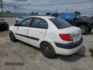 2009 Kia Rio LX with VIN KNADE223996526222, listed as a Copart auction lot 69976484 with 318,702 mi miles and Salvage Title. Bid and sale history available at DreamBid. Image 2.
