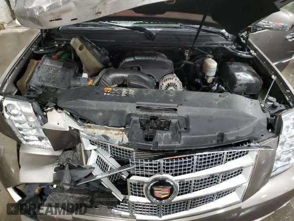 2014 Cadillac Escalade Platinum z VIN 1GYS4DEFXER185821, wystawiony jako Copart lot #78926874 z przebiegiem 142 534 mil mil oraz Szkoda całkowita • Salvage title. Historia ofert i sprzedaży dostępna na DreamBid. Obrazek 13.