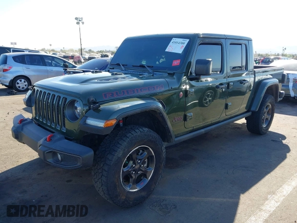 2022 Jeep Gladiator Rubicon z VIN 1C6JJTBG1NL163699, wystawiony jako IAAI lot #41014300 z przebiegiem Nie podano mil oraz . Historia ofert i sprzedaży dostępna na DreamBid. Obrazek 2.