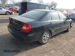 2003 Toyota Camry LE with VIN 4T1BE32K33U176270, listed as a IAAI auction lot 41995146 with 223,032 mi miles and . Bid and sale history available at DreamBid. Image 4.