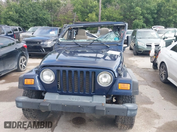 2006 Jeep Wrangler SE with VIN 1J4FA29156P739521, listed as a IAAI auction lot 42563566 with 117,281 mi miles and . Bid and sale history available at DreamBid. Image 12.