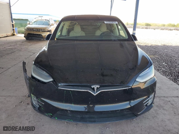 2017 Tesla Model X P100D with VIN 5YJXCDE42HF052851, listed as a Copart auction lot 75763854 with NaN miles and Salvage Title. Bid and sale history available at carsss.com. Image 5.
