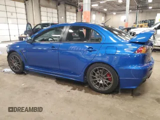 2015 Mitsubishi Lancer Evolution Final Edition with VIN JA32W7FV6FU028162, listed as a Copart auction lot 44627255 with 129,831 mi miles and Salvage Title. Bid and sale history available at carsss.com. Image 2.