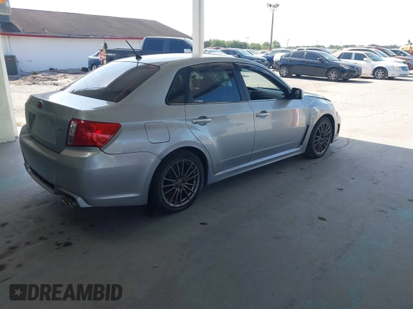 2013 Subaru Impreza Sedan WRX WRX with VIN JF1GV7E60DG014909, listed as a IAAI auction lot 42127645 with 70,360 mi miles. Bid and sale history available at carsss.com. Image 4.