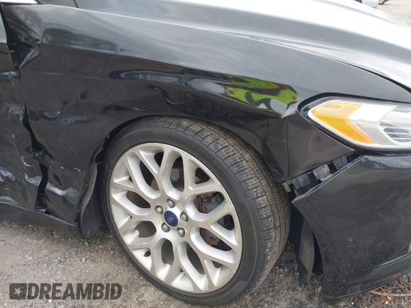 2014 Ford Fusion Titanium with VIN 3FA6P0K92ER355539, listed as a IAAI auction lot 41851471 with 178,176 mi miles and . Bid and sale history available at DreamBid. Image 12.