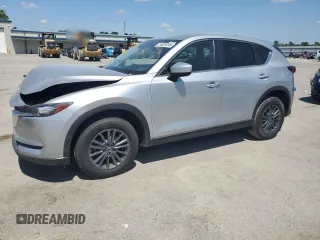 2020 Mazda CX-5 Touring z VIN JM3KFBCM2L1824072, wystawiony jako Copart lot #54825295 z przebiegiem 99 420 mil mil oraz Szkody całkowita. Historia ofert i sprzedaży dostępna na DreamBid. Obrazek 1.