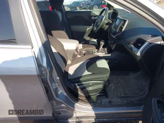 2014 Jeep Cherokee Latitude with VIN 1C4PJMCBXEW107559, listed as a IAAI auction lot 41859246 with 94,812 mi miles and . Bid and sale history available at DreamBid. Image 5.