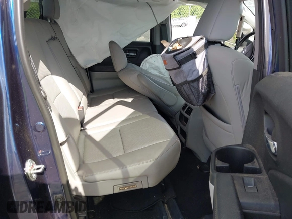 2019 Honda Ridgeline RTL-E with VIN 5FPYK3F76KB010613, listed as a IAAI auction lot 42079810 with 90,492 mi miles and . Bid and sale history available at DreamBid. Image 8.