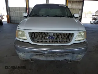 2001 Ford F-150 XLT z VIN 1FTRW08L91KB86700, wystawiony jako Copart lot #57443015 z przebiegiem 340 550 mil mil oraz Czysty tytuł • Clean title. Historia ofert i sprzedaży dostępna na DreamBid. Obrazek 5.