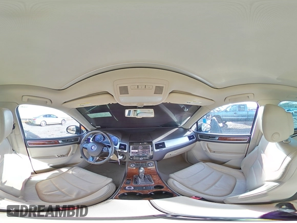 2012 Volkswagen Touareg Lux z VIN WVGEK9BP4CD008562, wystawiony jako Copart lot #47947675 z przebiegiem 136 048 mil mil oraz Szkoda całkowita • Salvage title. Historia ofert i sprzedaży dostępna na DreamBid. Obrazek 14.