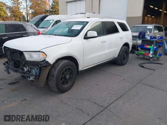 2015 Dodge Durango SXT with VIN 1C4RDJAG1FC745974, listed as a IAAI auction lot 41392820 with 124,861 mi miles and . Bid and sale history available at DreamBid. Image 18.