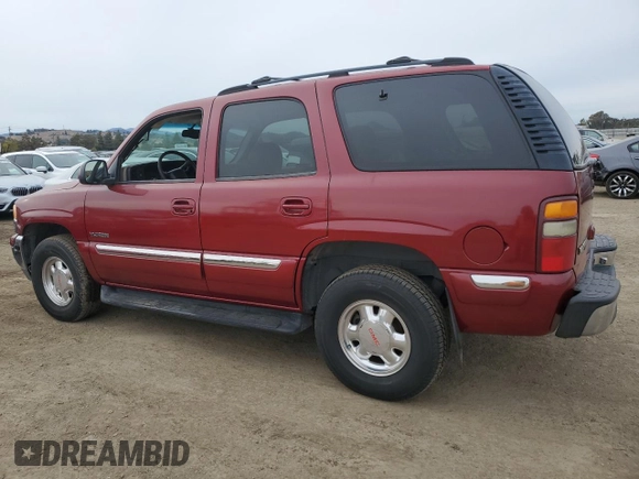 2001 GMC Yukon SLT z VIN 1GKEC13T21J302687, wystawiony jako Copart lot #80982344 z przebiegiem 139 565 mil mil oraz Szkoda całkowita • Salvage title. Historia ofert i sprzedaży dostępna na DreamBid. Obrazek 2.