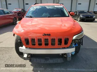 2021 Jeep Cherokee Altitude with VIN 1C4PJLLB0MD120101, listed as a Copart auction lot 57045855 with 61,377 mi miles and Salvage title. Bid and sale history available at DreamBid. Image 5.