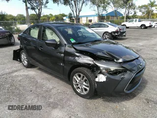 2016 Scion iA z VIN 3MYDLBZV1GY126758, wystawiony jako IAAI lot #33312589 z przebiegiem 69 148 mil mil oraz . Historia ofert i sprzedaży dostępna na DreamBid. Obrazek 1.