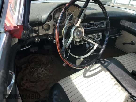 1957 Ford Thunderbird with VIN D7FH395675, listed as a Copart auction lot 77234434 with 15,312 mi miles and Salvage Title. Bid and sale history available at DreamBid. Image 8.