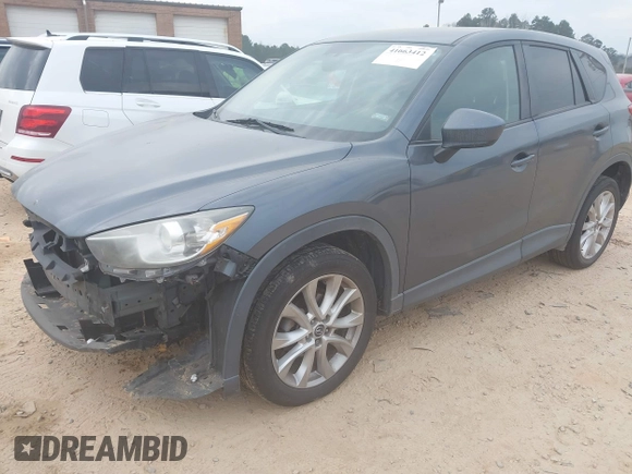 2013 Mazda CX-5 Grand Touring with VIN JM3KE4DE2D0164225, listed as a IAAI auction lot 41663412 with 162,738 mi miles. Bid and sale history available at carsss.com. Image 17.