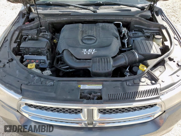 2013 Dodge Durango SXT with VIN 1C4RDHAGXDC592730, listed as a Copart auction lot 60841945 with 130,239 mi miles and Salvage title. Bid and sale history available at DreamBid. Image 12.