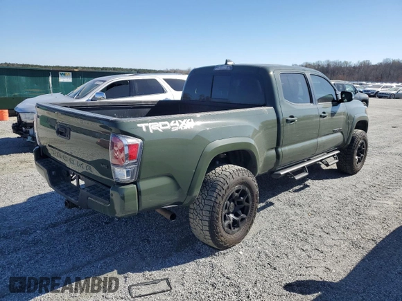 2021 Toyota Tacoma 4WD SR5 with VIN 3TMDZ5BN3MM111433, listed as a Copart auction lot 47736135 with 73,061 mi miles and Salvage Title. Bid and sale history available at carsss.com. Image 3.