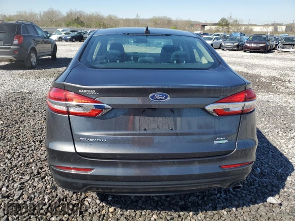 2019 Ford Fusion SE with VIN 3FA6P0HD9KR158973, listed as a Copart auction lot 50158435 with 76,956 mi miles and Salvage Title. Bid and sale history available at DreamBid. Image 6.