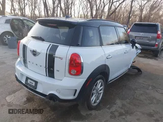 2015 MINI Cooper Countryman S with VIN WMWZC5C50FWP42324, listed as a IAAI auction lot 41795698 with 95,746 mi miles. Bid and sale history available at carsss.com. Image 4.