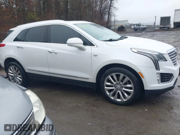 2017 Cadillac XT5 Platinum AWD with VIN 1GYKNFRS1HZ172301, listed as a IAAI auction lot 41847790 with 132,314 mi miles. Bid and sale history available at carsss.com. Image 13.