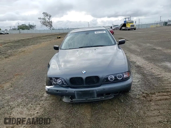 2000 BMW 5 Series 528iA with VIN WBADM6346YGU12169, listed as a Copart auction lot 82372384 with 152,818 mi miles and Salvage Title. Bid and sale history available at carsss.com. Image 10.