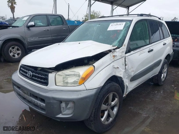 2003 Toyota RAV4 with VIN JTEGH20V730119789, listed as a IAAI auction lot 41809263 with 140,028 mi miles. Bid and sale history available at carsss.com. Image 2.