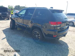 2017 Jeep Grand Cherokee Trailhawk with VIN 1C4RJFLG4HC940652, listed as a IAAI auction lot 42135489 with 102,593 mi miles and . Bid and sale history available at DreamBid. Image 3.