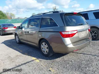 2012 Honda Odyssey LX with VIN 5FNRL5H29CB091860, listed as a IAAI auction lot 42000688 with 295,551 mi miles. Bid and sale history available at carsss.com. Image 3.