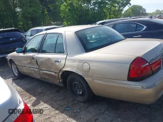 2000 Mercury Grand Marquis LS z VIN 2MEFM75W5YX627647, wystawiony jako IAAI lot #42072795 z przebiegiem 188 113 mil mil oraz . Historia ofert i sprzedaży dostępna na DreamBid. Obrazek 14.