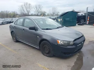 2010 Mitsubishi Lancer DE with VIN JA32U1FU7AU005962, listed as a IAAI auction lot 41927652 with 218,829 mi miles. Bid and sale history available at carsss.com. Image 1.