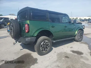 2022 Ford Bronco z VIN 1FMDE5BHXNLA88611, wystawiony jako Copart lot #58135415 z przebiegiem 15 448 mil mil oraz Nie do naprawy • Non repairable. Historia ofert i sprzedaży dostępna na DreamBid. Obrazek 3.
