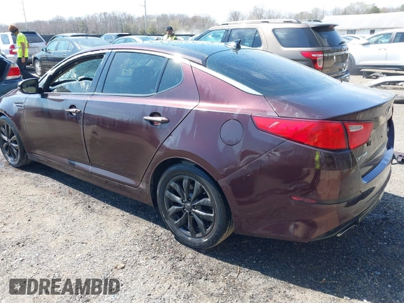 2014 Kia Optima EX with VIN 5XXGN4A70EG266191, listed as a IAAI auction lot 41895612 with 229,472 mi miles and . Bid and sale history available at carsss.com. Image 3.