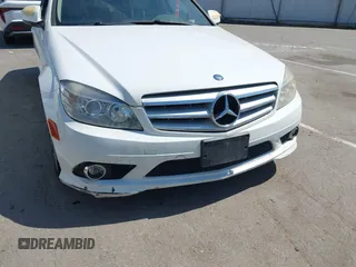 2009 Mercedes-Benz C-Class 3.0L Sport with VIN WDDGF54X09F233877, listed as a IAAI auction lot 42121123 with 215,698 mi miles. Bid and sale history available at carsss.com. Image 12.