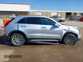 2019 Cadillac XT4 FWD Premium Luxury with VIN 1GYFZCR47KF110481, listed as a IAAI auction lot 41771338 with 103,124 mi miles and . Bid and sale history available at carsss.com. Image 14.