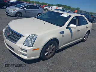 2008 Cadillac STS RWD z VIN 1G6DZ67A580168157, wystawiony jako IAAI lot #42133003 z przebiegiem 133 928 mil mil oraz . Historia ofert i sprzedaży dostępna na DreamBid. Obrazek 17.