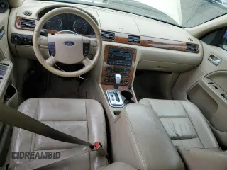 2007 Ford Five Hundred SEL with VIN 1FAHP24137G163701, listed as a Copart auction lot 60826555 with 169,948 mi miles and Salvage title. Bid and sale history available at DreamBid. Image 8.