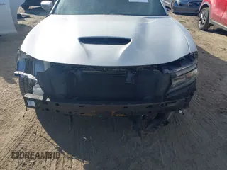 2019 Dodge Charger Scat Pack with VIN 2C3CDXGJXKH599632, listed as a IAAI auction lot 41666680 with 116,995 mi miles and . Bid and sale history available at DreamBid. Image 13.